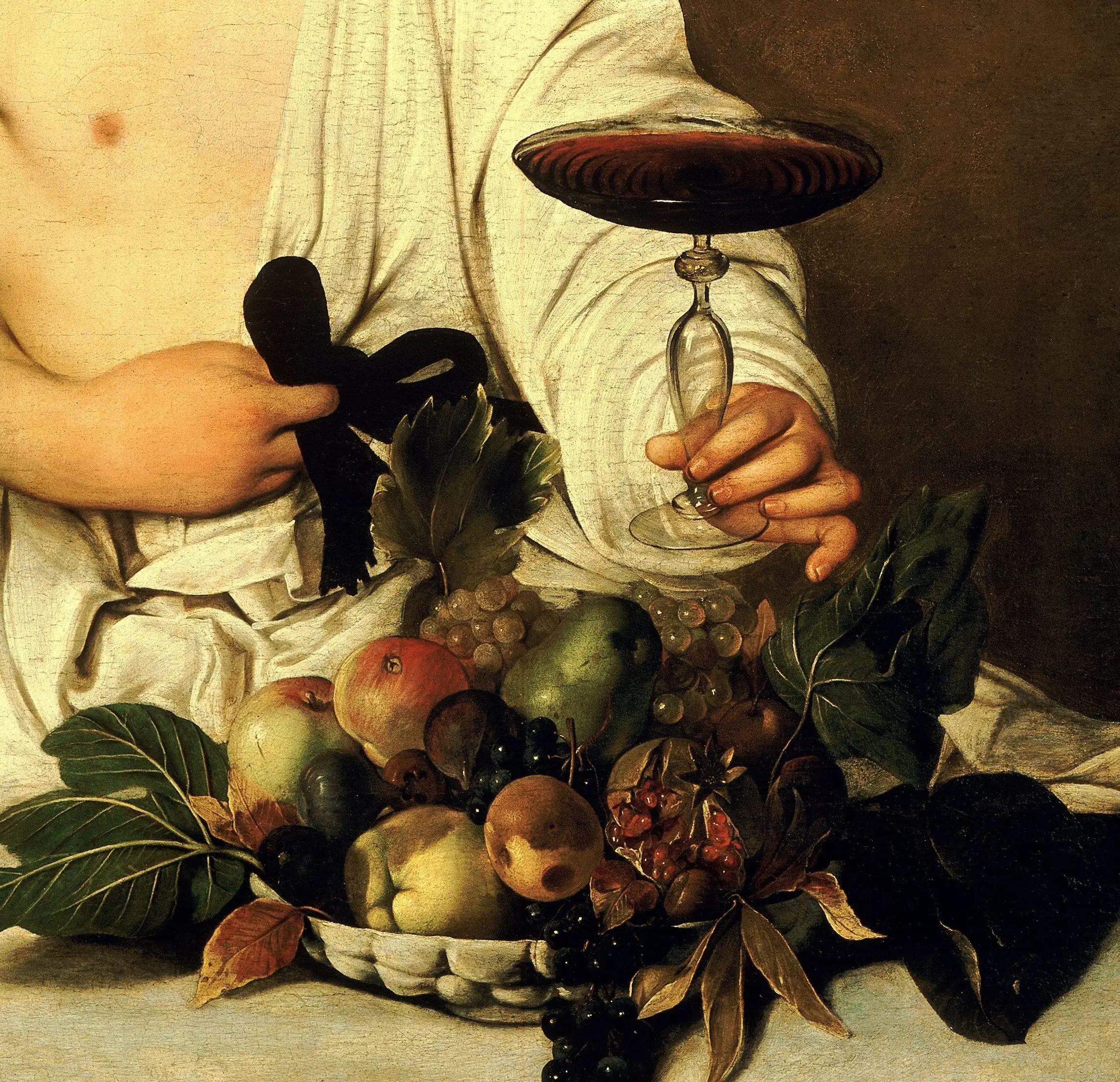 Detail of Bacchus: the wine still swinging in the tilted glass, the bruise on the apple, the split pomegranate, the wormhole and the dry curling leaves. This is the trade he was hired for in Rome as a piecework hand, painting flowers and fruit in another man's shop.
