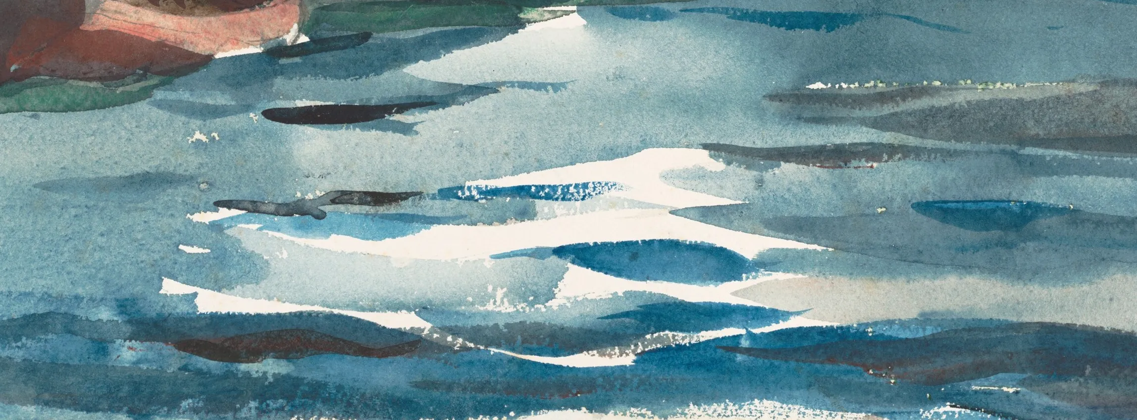 Detail of Sloop, Nassau at the water: every white here is the sheet. The hard edges are where the wash was stopped or lifted clean off, and the speckle running along them is pigment left sitting in the pits of the paper. Nothing white was put on top.