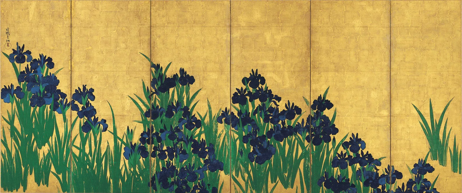The left screen of the Irises in the Nezu Museum, about a metre and a half high and three and a half metres across. There is no ground, no water, no horizon and no sky. Banks of iris start at the bottom edge, climb, drop away, and gold does the rest. He signed it at the top left, above the first cluster of flowers.