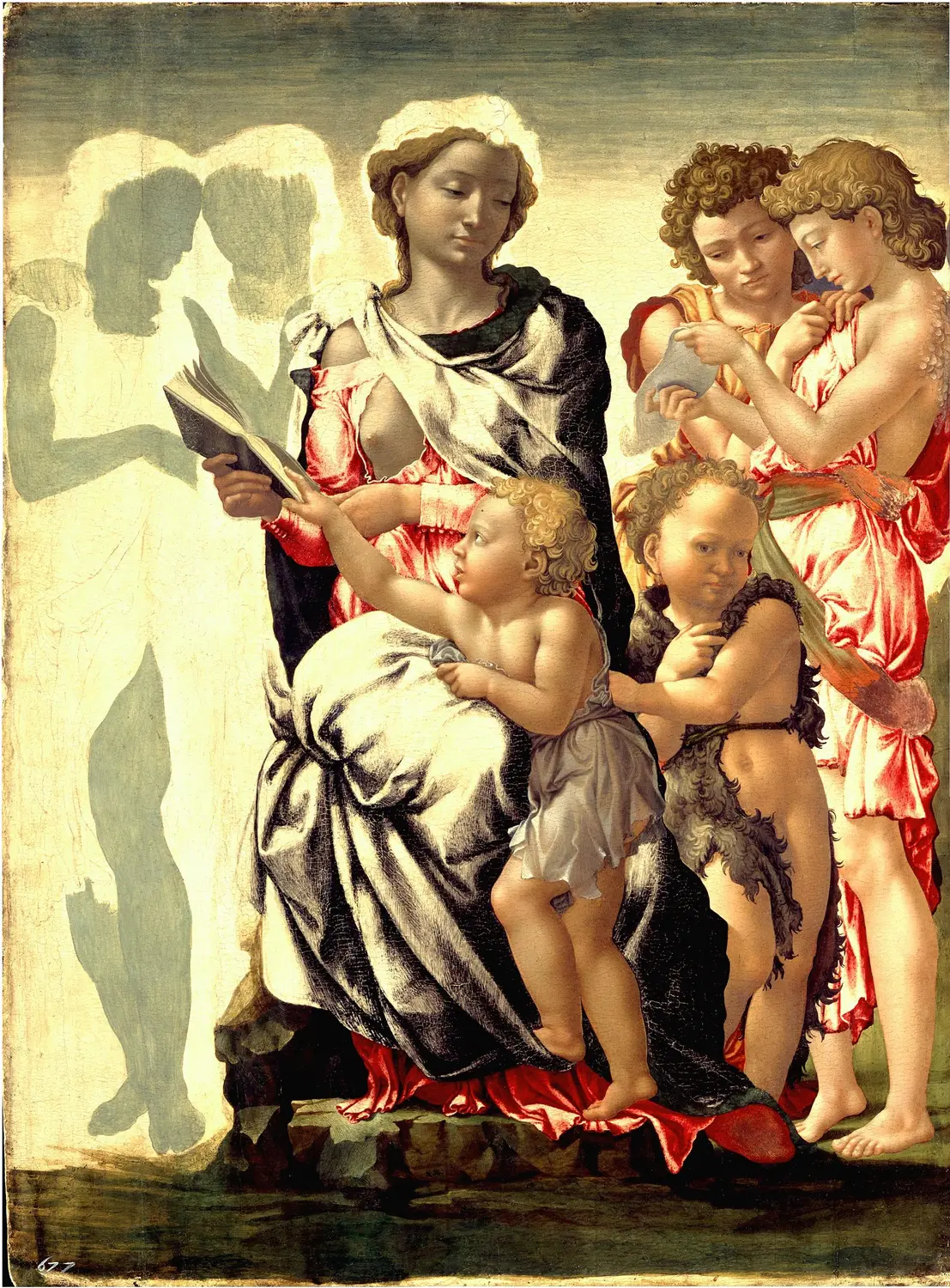 The Manchester Madonna, tempera on wood, left unfinished. The two angels at the left are still flat green with the drawn outline showing through and no flesh color on top. The two at the right are finished, so the same panel holds the stage and the result side by side.