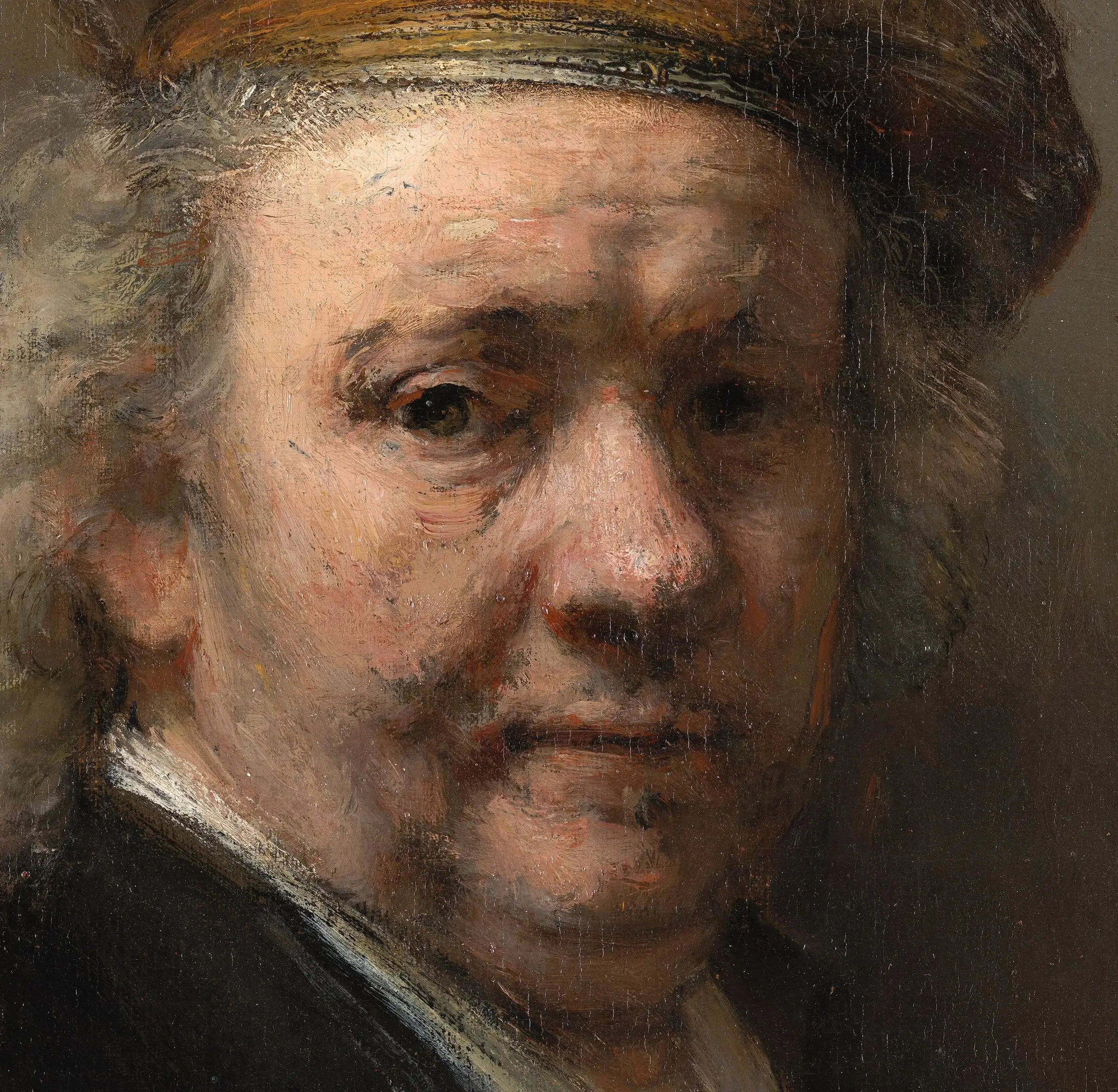 Detail of the last self portrait, painted in the year he died: the lit forehead, the cheek and the end of the nose are laid on thick and left rough, with the paint standing up off the canvas, while the shadow side of the face stays thin and smooth. The brightest part of the picture is also the highest.