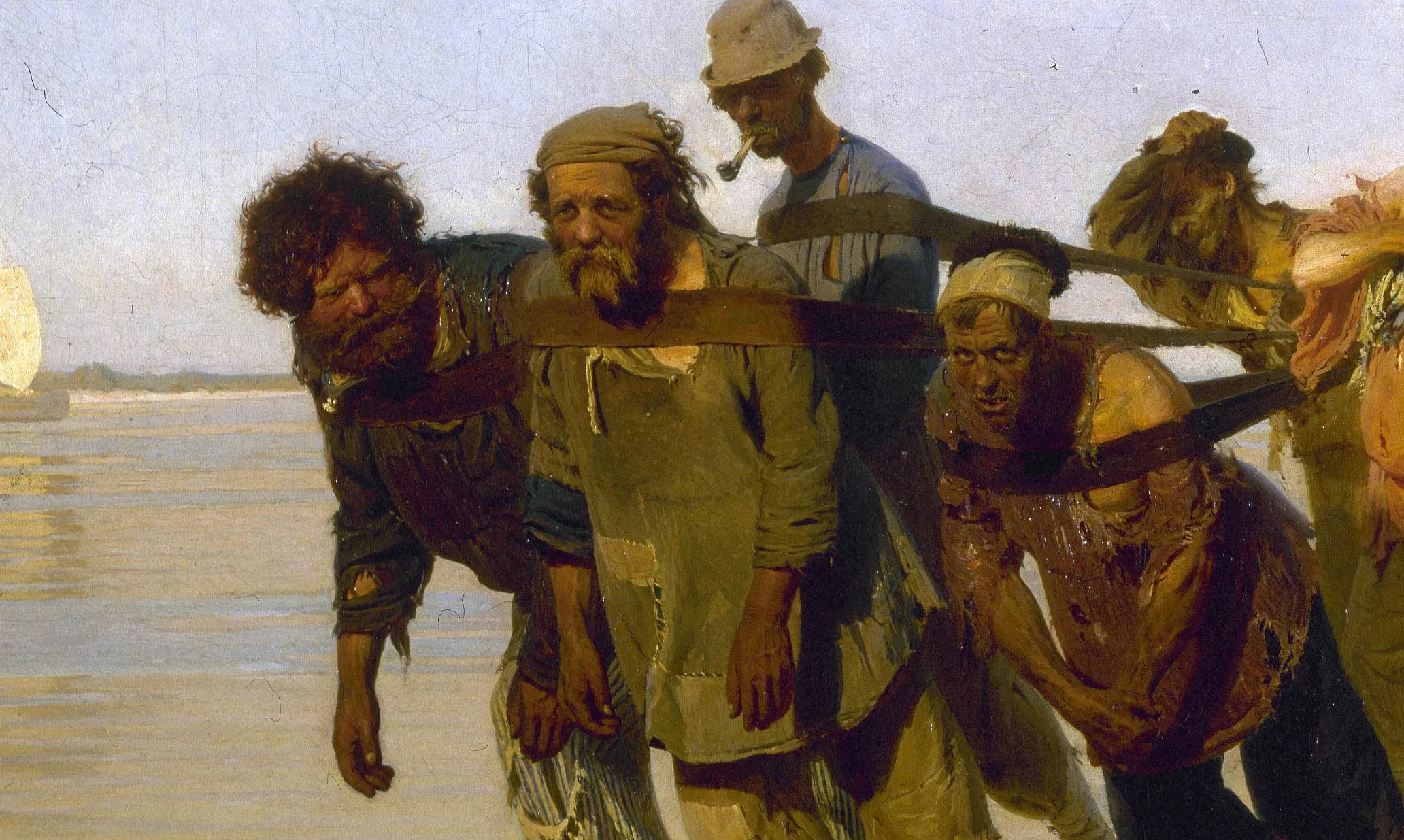 Detail of Barge Haulers on the Volga: the front rank of the team, each face a separate portrait drawn from a real man Repin met on the river, the leather tow strap biting into the chest and the hands hanging heavy with the pull.