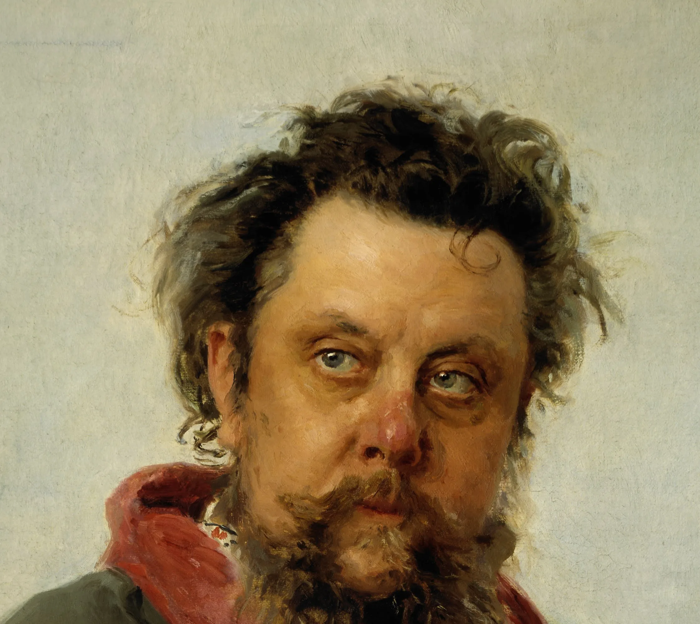 Detail of the portrait of the composer Modest Mussorgsky, painted over a few days in a hospital ward just before his death: the flushed nose, the unfocused eyes, and the loose hair set down plainly, the crimson facing of the gown struck in wet, a sick man reported without flattery.