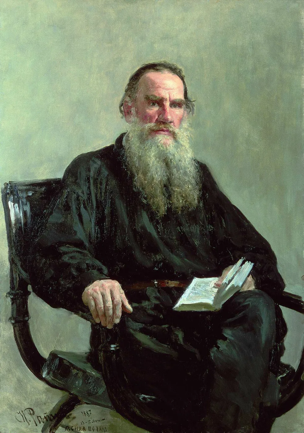 Portrait of Leo Tolstoy, painted at the writer's estate at Yasnaya Polyana in 1887: the black peasant blouse laid in broad and dark, a book held open in the lap, the whole picture built to carry the head and the hands.