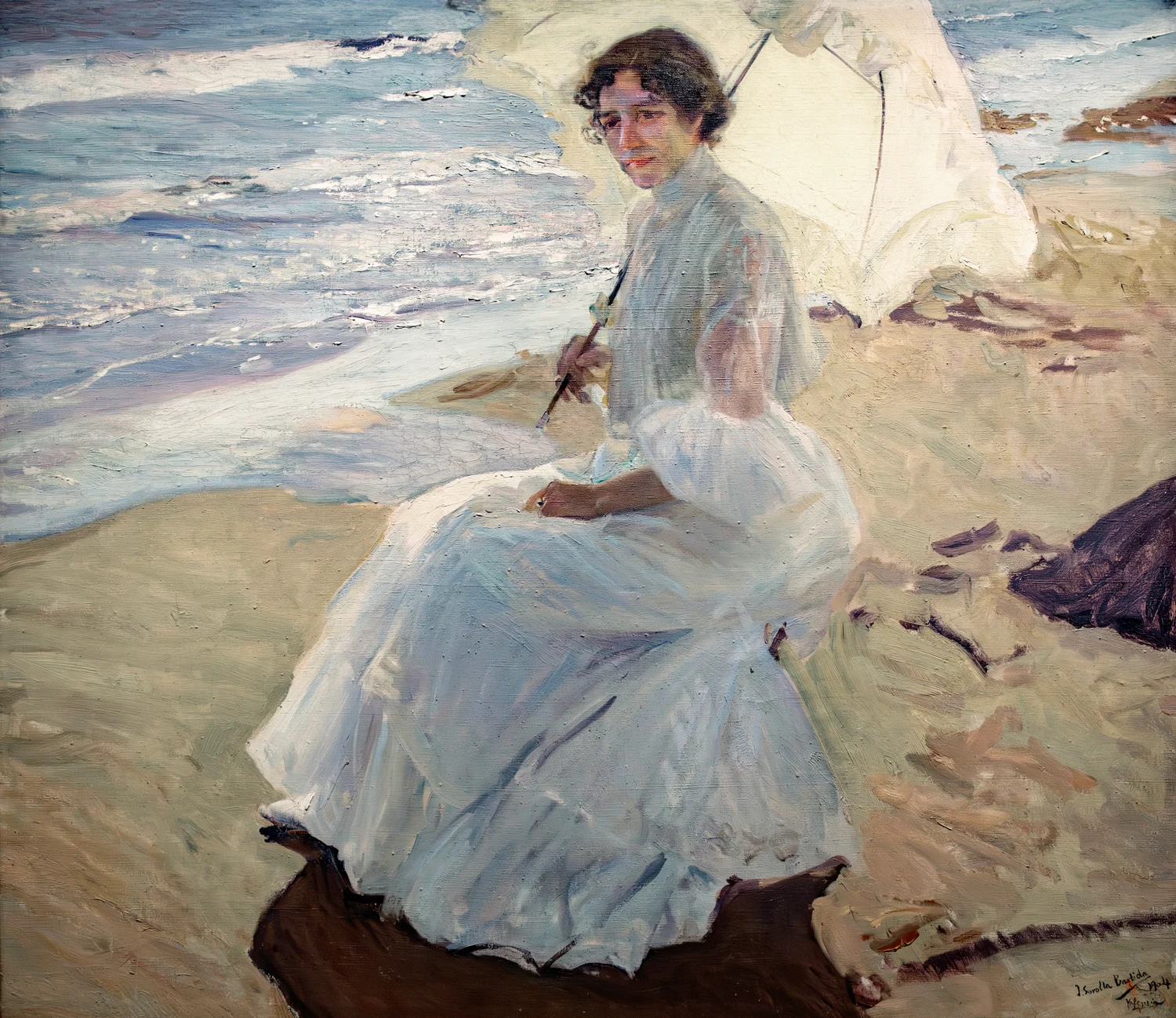 Clotilde en la playa: the dress is the whole light system in one object. Where the sun lands on it the white goes on thick and opaque. Where the folds turn away, the paint thins to blue and grey over the ground, and the sand beneath her runs the same two temperatures.