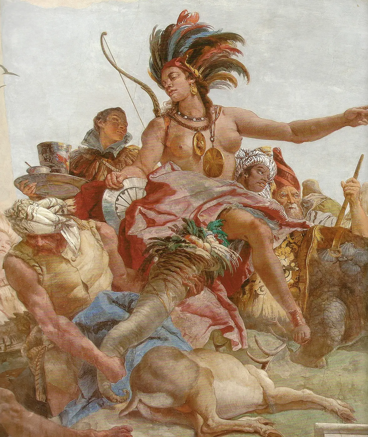 The America group on the Wuerzburg staircase vault: a feathered headdress, a bow, a crocodile for a mount. The sky behind is a cool pale grey, and every figure is drawn as if the viewer were lying on the staircase floor looking straight up.