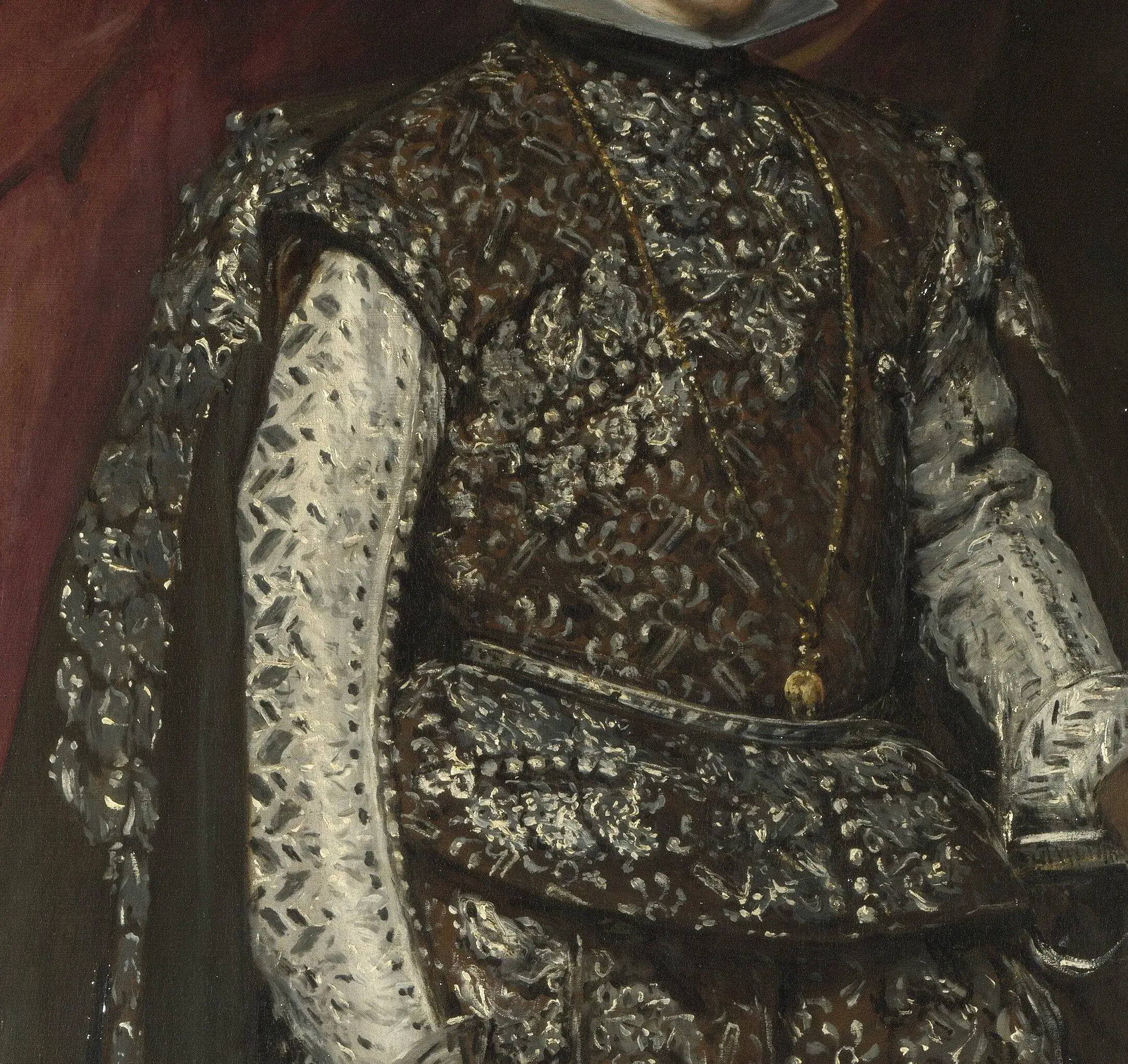 Detail of Philip IV in Brown and Silver: the silver embroidery is a scatter of loaded grey and white dabs over the brown ground, tied together with quick black lines. Up close it is abstract, at distance it reads as thread and light.